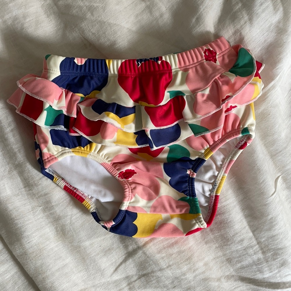 Baby boden in floral swim diaper cover